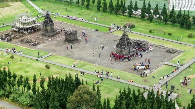 Destination spot for tourist - Arjuna Temple in Dieng Plateau, aerial orbit view