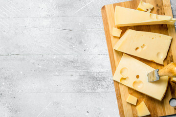 Fresh cheese on the chopping Board.