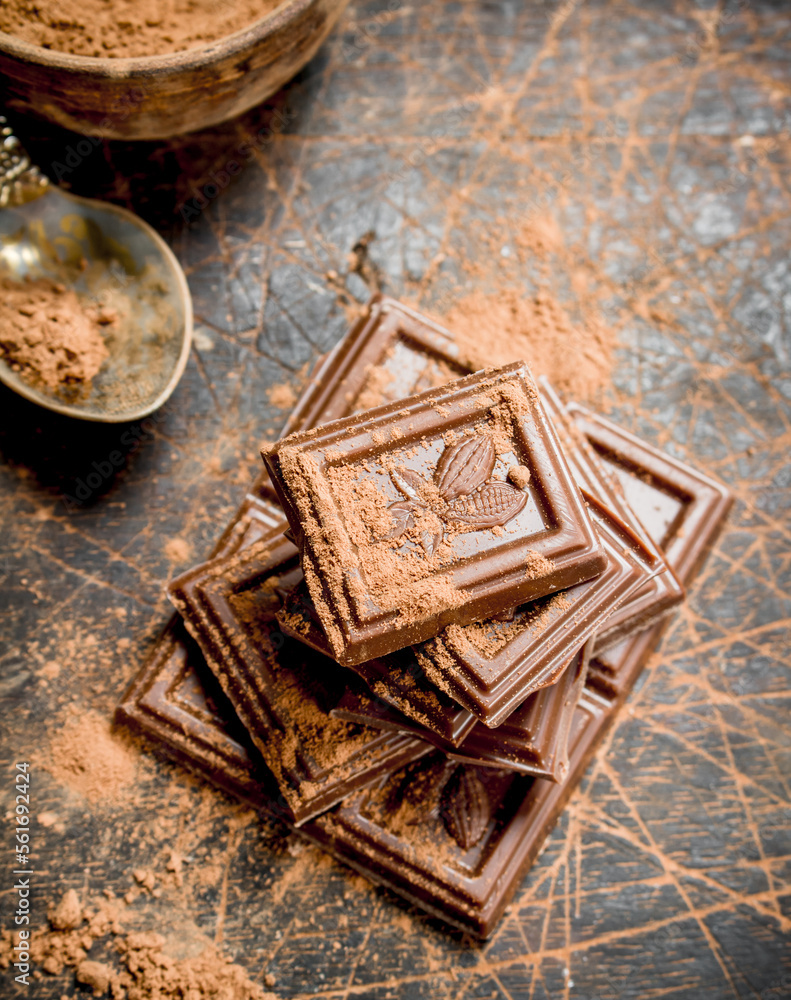 Sticker Chocolate slices with cocoa powder.