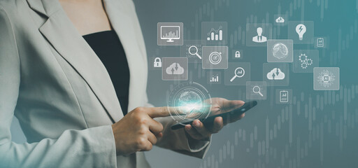 Businesswoman using smartphone in data management. Business, technology, internet and networking concept.
