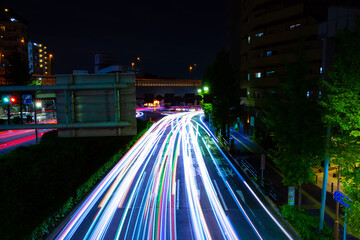 Fototapeta na wymiar A night traffic jam at the downtown street in Tokyo wide shot