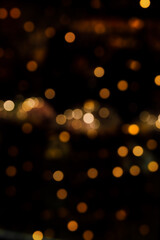 Gold bokeh blur defocus in black backgeound