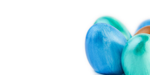 Colorful handmade Easter eggs, close-up on white