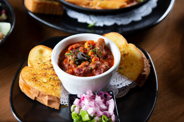 A view of a small bowl of chili.