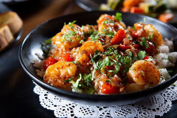 A view of a plate of Spanish garlic shrimp.