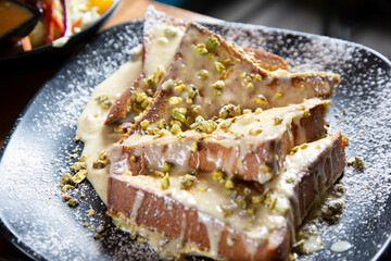 A view of a plate of lemon pistachio French toast.