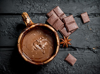 Hot chocolate with cinnamon sticks.