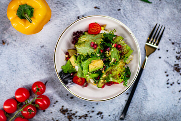 salad with cream, pomegranate, pistachios and walnuts