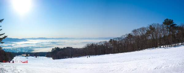 Quiet ski slope and cloudseas formed by temperature inversion below (Inawashiro, Fukushima, Japan)