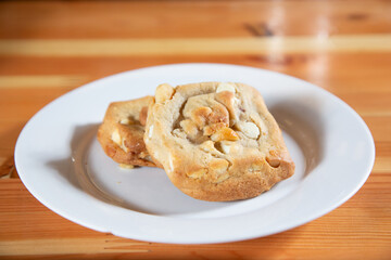A view of a plate of macadamia nut cookies.