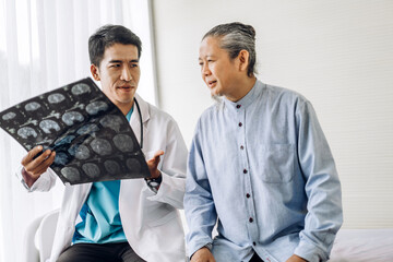 Asian man doctor service help support discussing and consulting talk to asian sick senior man patient at meeting health medical care trust concept in hospital.healthcare and medicine