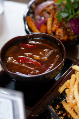 A view of a bowl of spicy blood soup.
