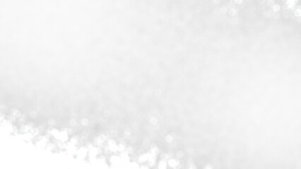 銀色の光。玉ボケ。ぼやけた光。冬のイメージ。