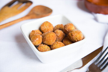 Spanish croquettes tapa. The croquette is a portion of dough made from a dense sauce such as bechamel and a mincemeat of various ingredients.