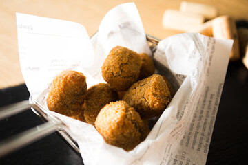 Spanish croquettes tapa. The croquette is a portion of dough made from a dense sauce such as bechamel and a mincemeat of various ingredients.