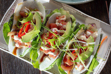 A top down view of a plate of ahi tacos.