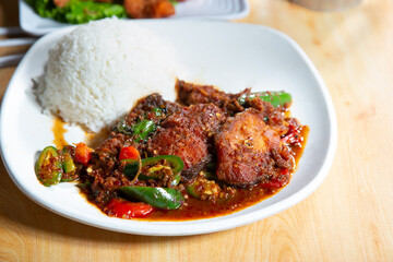A view of a plate of spicy chili chicken.