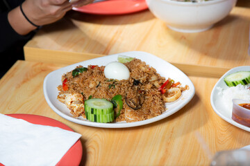 A view of a plate of crab fried rice.