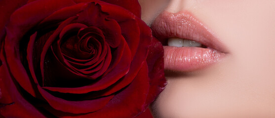 Female mouth with sexy pink lips isolated closeup. Close up woman sensual lips with red lipstick....