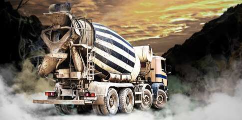 Concrete mixer truck at a construction site in smoke or fog. Delivery of concrete for pouring...