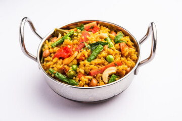 Bisi bele bath or bhath or huliyanna is a spicy, rice based dish from Karnataka, India