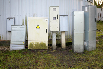Electrical outdoor cabinets of various sizes.