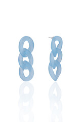 Fototapeta premium Subject shot of translucent light blue stud earrings made as chain links. The original earrings are isolated on the white background. Front and side views. Vogue accessory for ladies and girls.