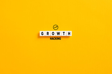 White letter blocks on yellow background with the word growth hacking. Growth hacking in marketing...