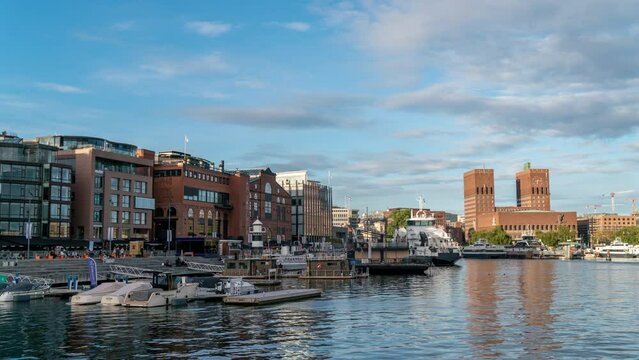 Oslo Aker Brygge with yachts, fast-moving blurred crowds, timelapse