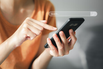 Woman using a Smart phone to Searching for information with the Search bar, Web browser, Data Search, Search Engine, Technology Concept