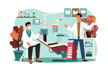 Stomatolog and nurses are looking at diagnosis results to give treatment in the tooth clinic.