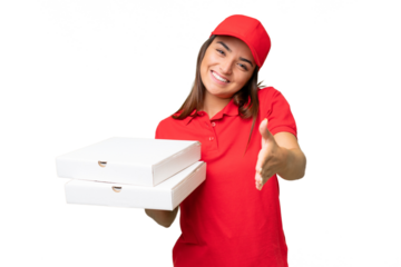 Pizza delivery caucasian woman with work uniform picking up pizza boxes isolated on green chroma background shaking hands for closing a good deal