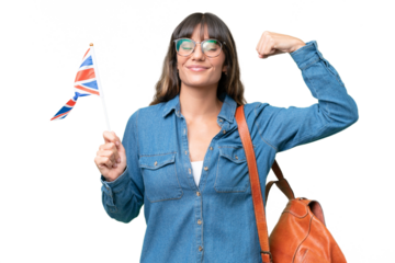 Young caucasian woman holding an United Kingdom flag over isolated background doing strong gesture