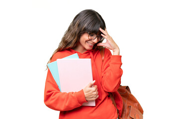 Young student caucasian woman over isolated background laughing