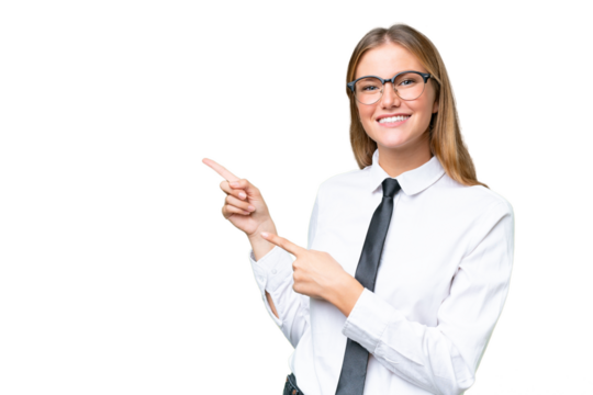 Young business caucasian woman over isolated background surprised and pointing side