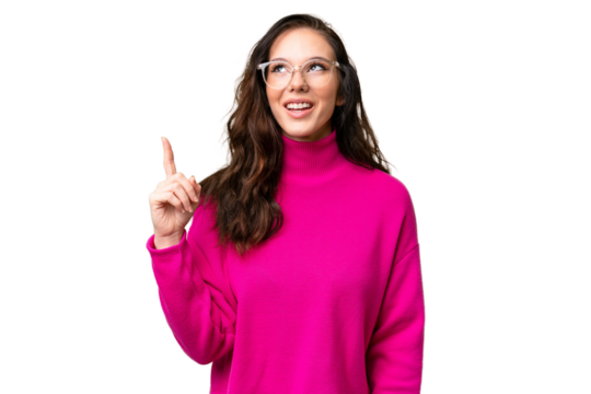 Young caucasian woman isolated over isolated background pointing up and surprised
