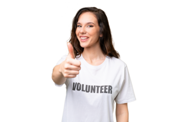 Young volunteer caucasian woman over isolated background with thumbs up because something good has happened