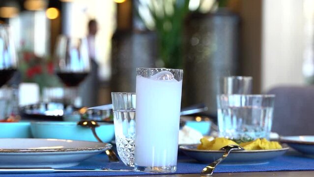 Ice Thrown on Turkish Traditional Raki Slow Motion