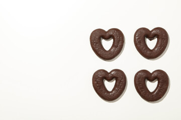 Concept of tasty bakery, gingerbread cookies in chocolate, space for text