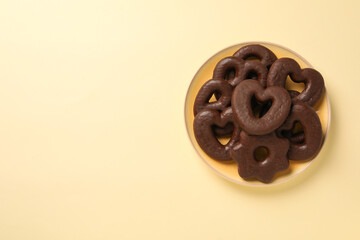 Concept of tasty bakery, gingerbread cookies in chocolate, space for text