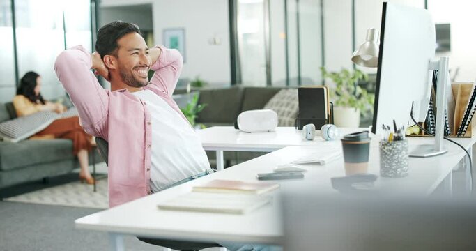 Asian man, relax and typing on computer in modern office for copywriting, planning strategy or online report success. Businessman, web digital networking and happy working on PC for website design