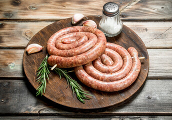 Raw sausage with rosemary and garlic.
