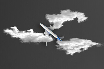 travel concept, airplane in the sky between the clouds