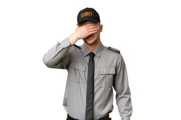 Fototapeta premium Young security caucasian man over isolated background covering eyes by hands. Do not want to see something