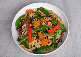 Delicious home cooked dishes. Stir Fry Lotus Root with Sweet Peas, Bunashimeji Mushrooms, Carrots with Chicken Cubes and Golden Pumpkin with Minced Pork. Tasty and healthy meal