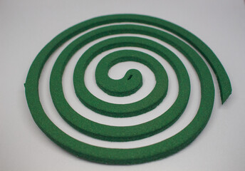 green spiral-shaped mosquito coils