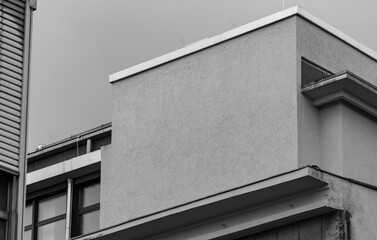 grayscale shot of a facade of a building