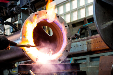 throwing fire into the steel plate