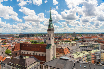 Germany, Munich, Clouds floating over St. PetersChurch
