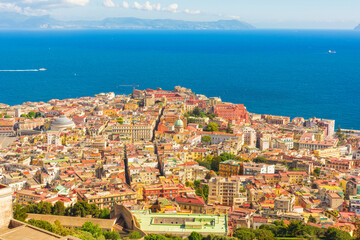 Fototapeta premium Aerial view of Naples city with Mediterranean sea, Campania, Italy. Cityscape of Napoli